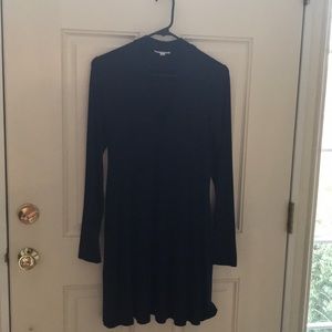 Navy long-sleeved dress with “V”cutout at chest